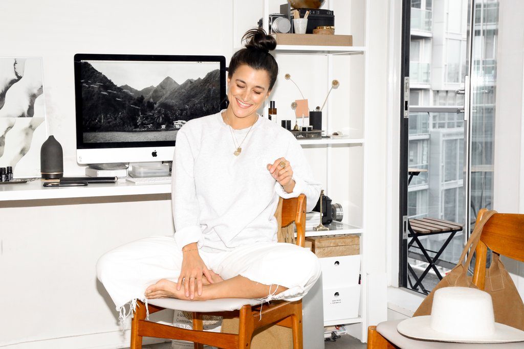 Female entrepreneur Britney Gill is photographed sitting in her Vancouver home.