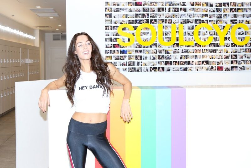 Daniela Dib is photographed standing by the front desk at SoulCycle in Vancouver.