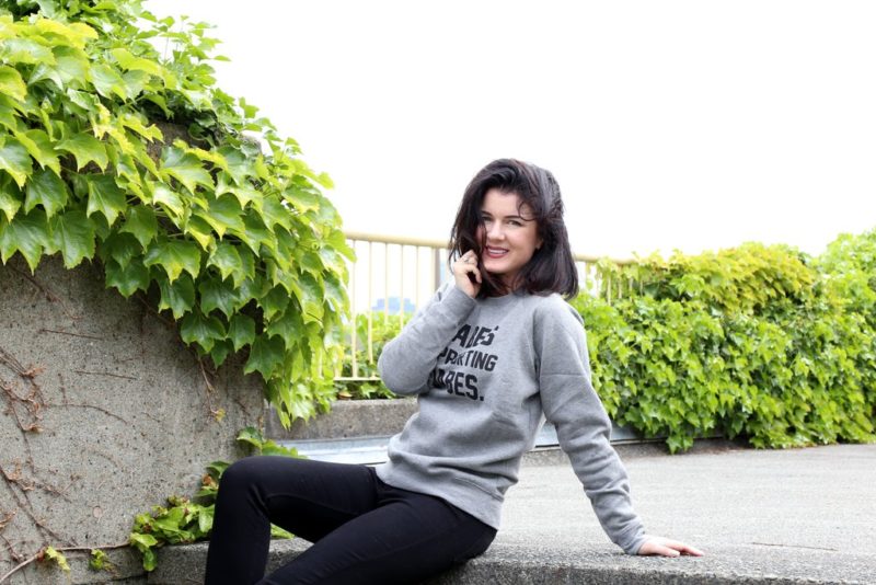 Gabrielle Miller of Corner Gas is photographed sitting outside in Vancouver.