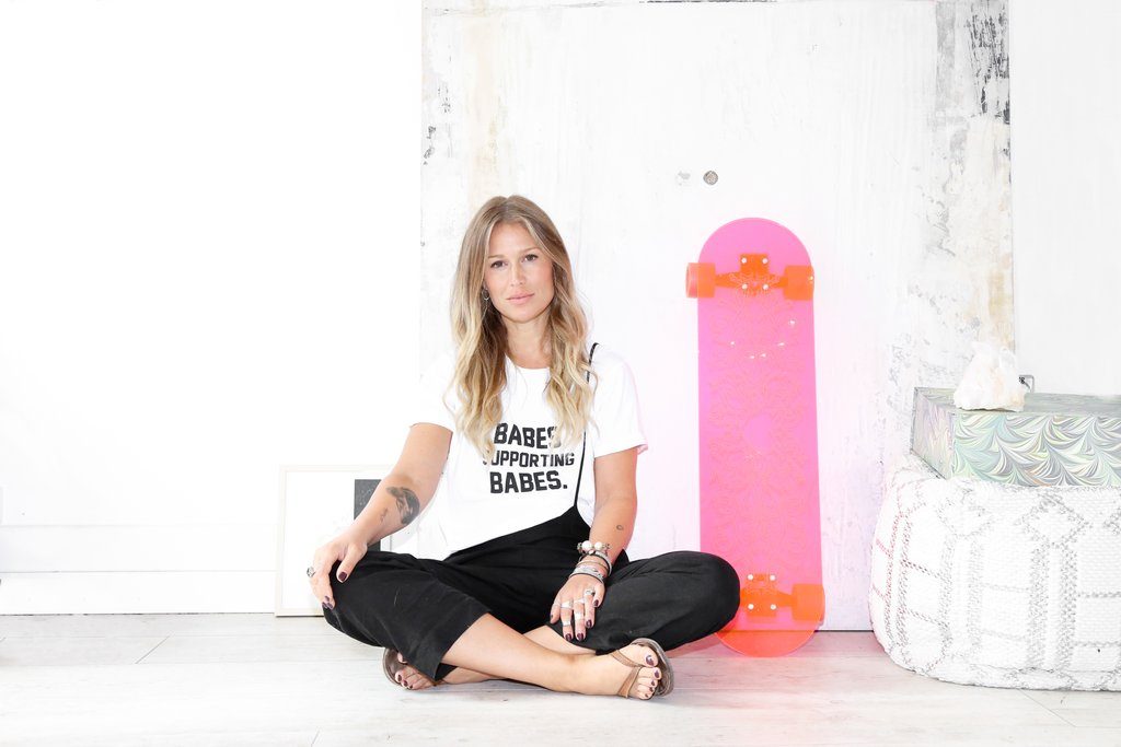 Kate Horsman is photographed wearing the Babes Supporting Babes Cropped Tee by Brunette the Label.