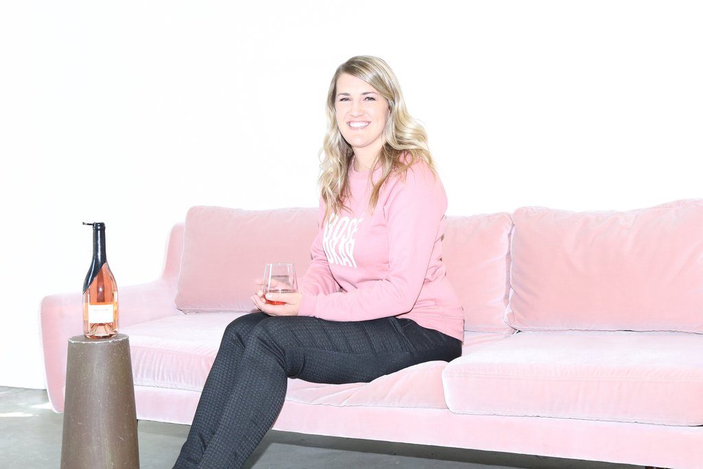 Margaret Leonardi is photographed sitting on the couch at the Brunette the Label Flagship Store.