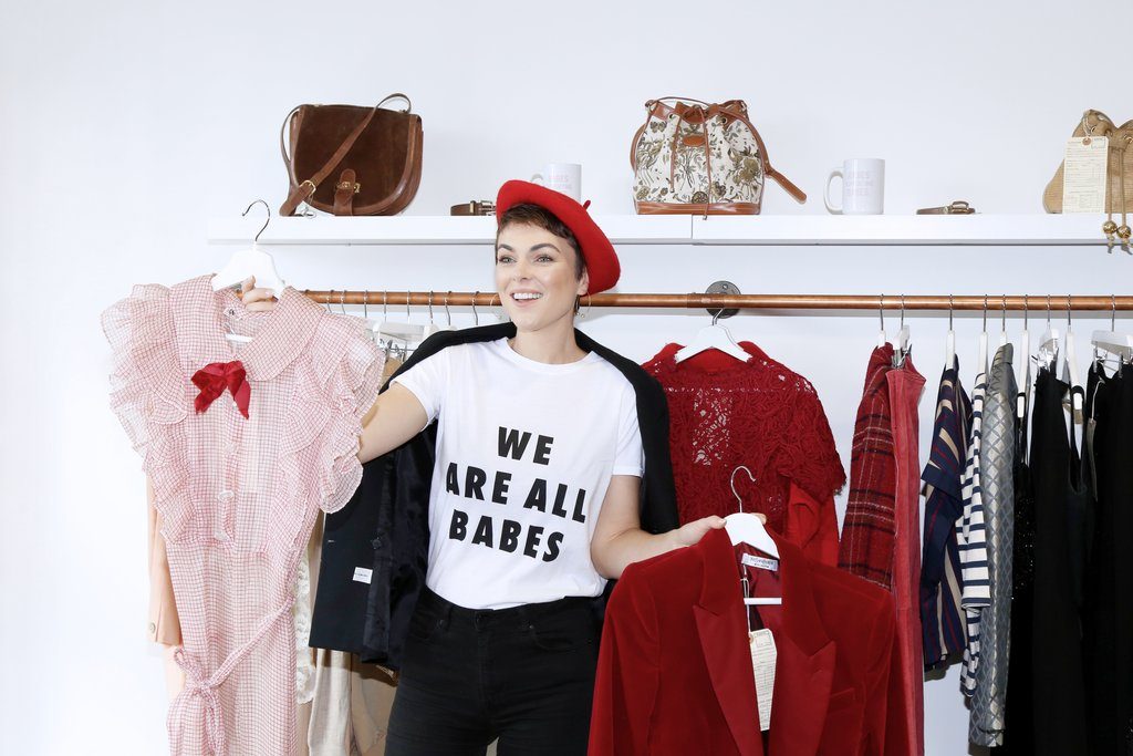 Serinda Swan is photographed with her 1914co Vintage collection while wearing the We Are All Babes Crew Neck Tee by Brunette the Label.