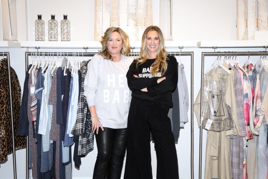 Female fashion entrepreneurs Susan Cooper and Heather Jansen are photographed wearing sweatshirts by Brunette the Label.
