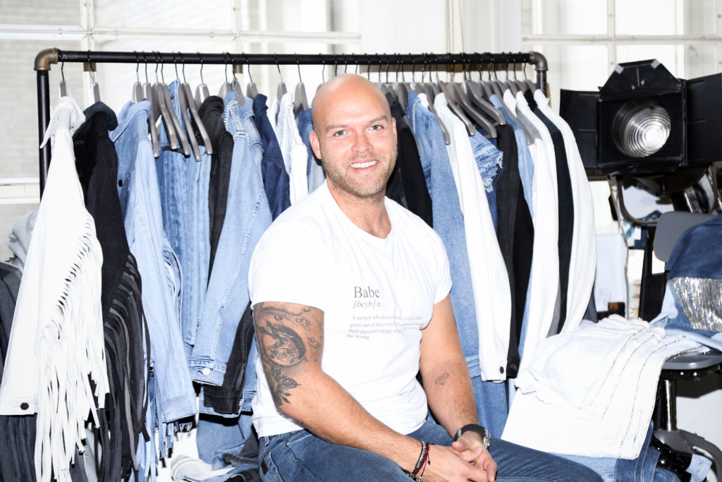 The founder of sustainable denim line Triarchy, Adam Taubenfligel, is photographed wearing a Brunette the Label shirt.