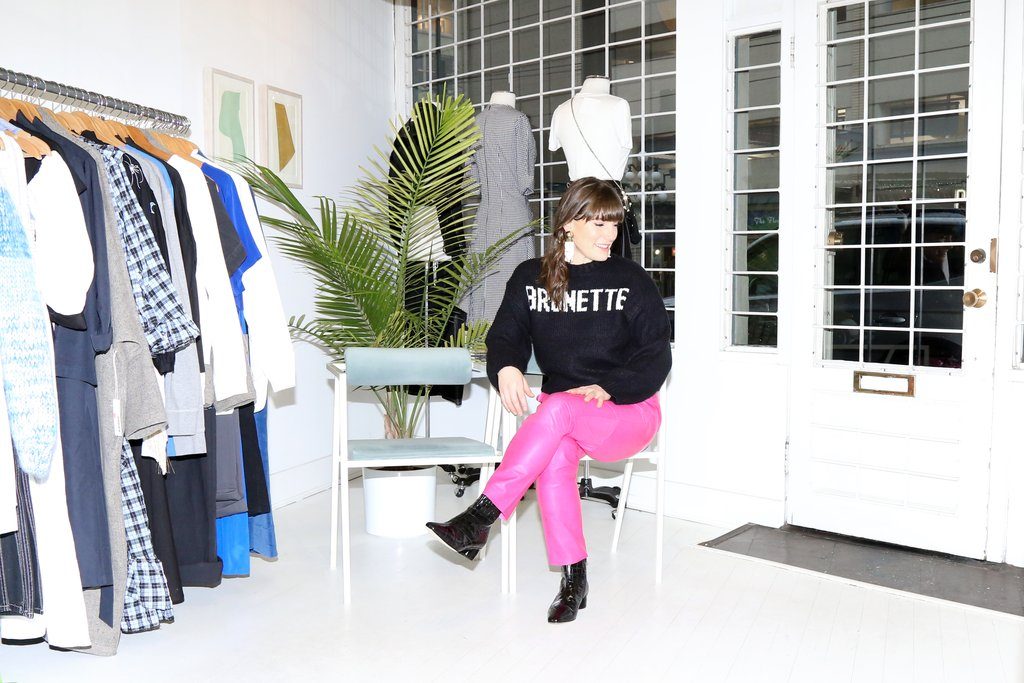 Female entrepreneur Michelle Rizzardo is photographed sitting in her Vancouver boutique, One of a Few.