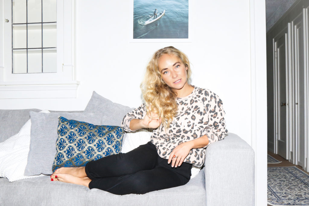 Mikaela Reuben, nutrition consultant, is photographed sitting in her Vancouver home.