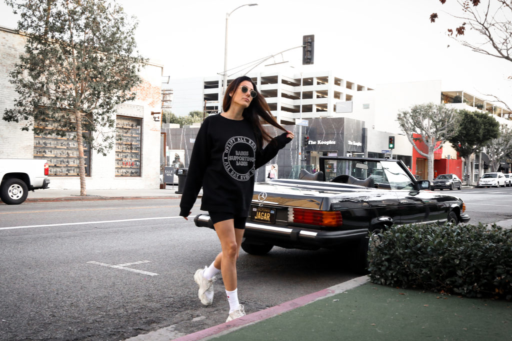 The female founder of Brunette the Label, Miriam Alden, is photographed walking in Los Angeles.