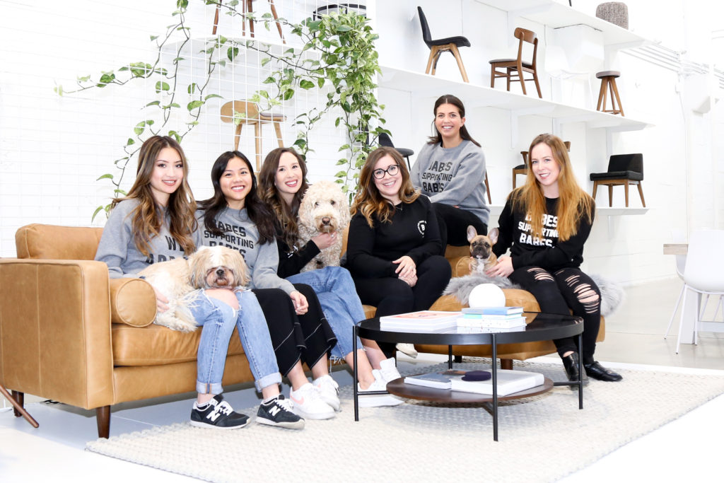 The Vancouver BC-based trade team of Article modern furniture is photographed wearing sweatshirt from The Babe Shop by Brunette the Label.