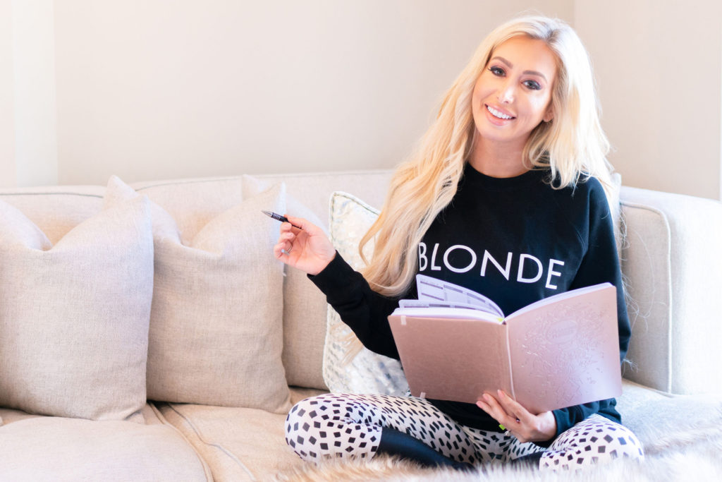 Female founder Sarah Pendrick of GirlTalk Network is photographed wearing the "BLONDE" Crew Neck Sweatshirt by Brunette the Label.