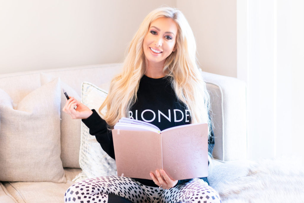 Female entrepreneur Sarah Pendrick is photographed working at her Los Angeles home and GirlTalk Network office.