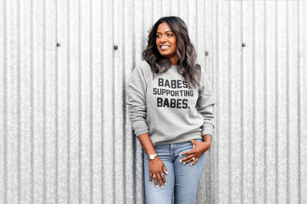 Beautycounter consultant and entrepreneur Tatum Blize is photographed wearing the Babes Supporting Babes Crew Neck Sweatshirt by Brunette the Label.