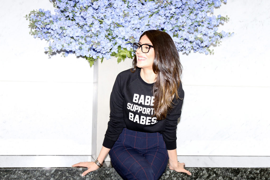 Female lawyer Donya Vahidi of Boughton Law is photographed wearing The Babes Supporting Babes Crew Neck Sweatshirt by Brunette the Label.