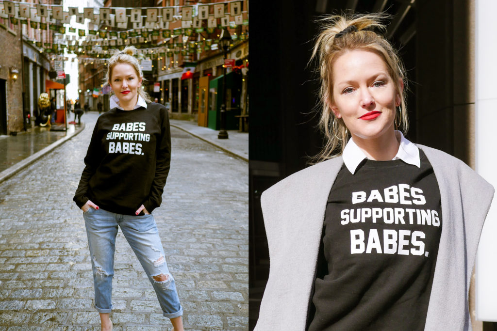 Shannon Judd of Transition Sports & Entertainment is photographed in The Babes Supporting Babes Crew Neck Sweatshirt in Black by Brunette the Label.