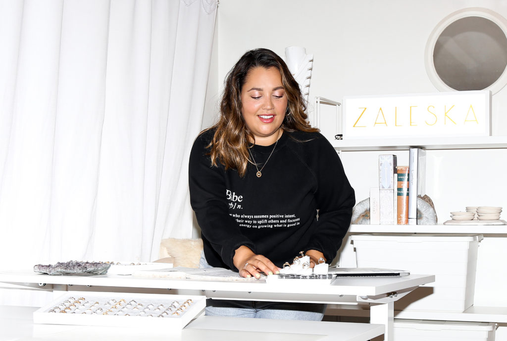 Female founder Sylvia Tennant is photographed working at the Zaleska Jewelry office.