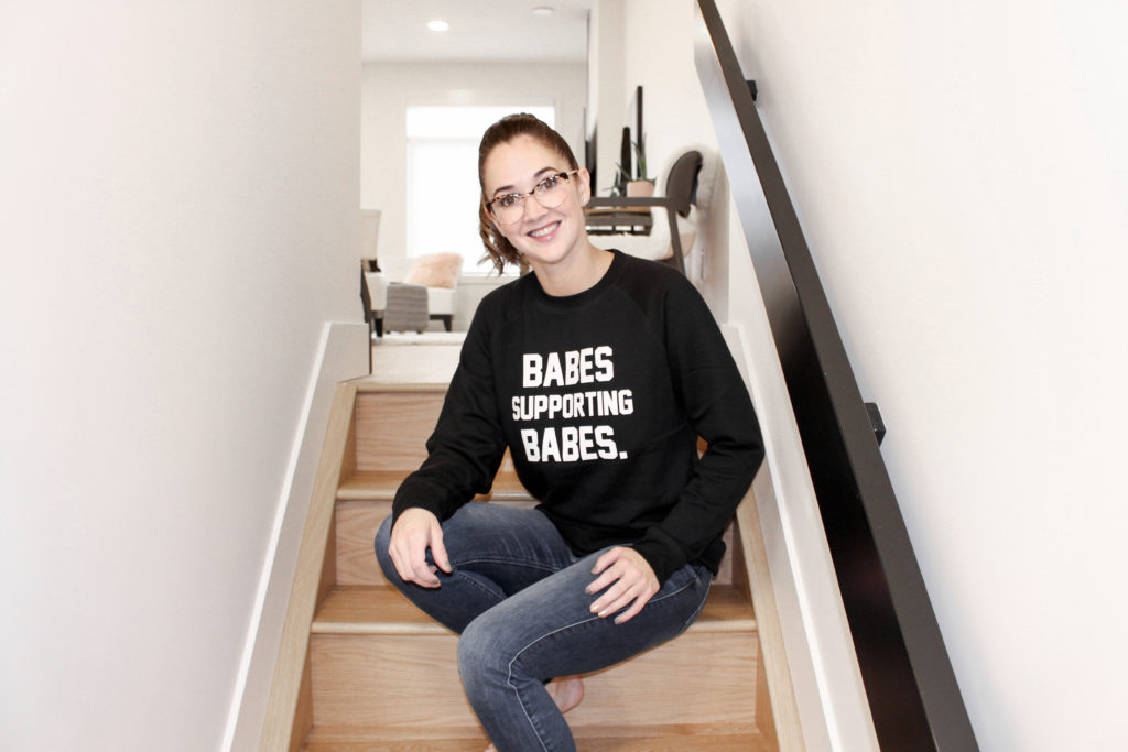 The female entrepreneur behind Money Boss, Selina Gray, is photographed at her home in Calgary, Alberta wearing Brunette the Label.